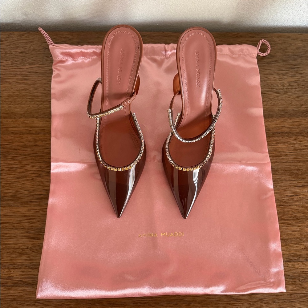 Amina Muaddi Patent Pointed Mules with Crystal Straps in Brown